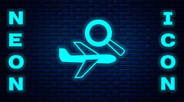 Parlayan Neon Uçak Arama Ikonu Tuğla Duvar Arka Planında Izole — Stok Vektör