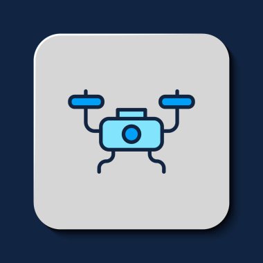 Filled outline Drone flying icon isolated on blue background. Quadrocopter with video and photo camera symbol.  Vector