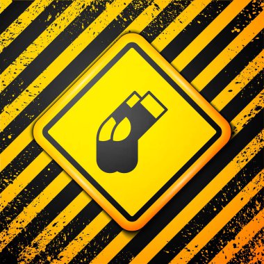 Black Socks icon isolated on yellow background. Warning sign. Vector