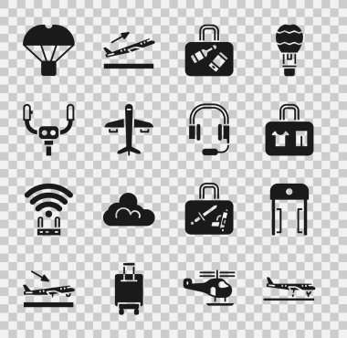 Uçak, havaalanında metal dedektör, bavul, uçak dümeni, paraşütle uçan kutu ve mikrofon ikonlu kulaklık. Vektör