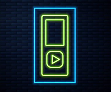 Parlayan neon hattı müzik çalar simgesi tuğla duvar arka planında izole edildi. Taşınabilir müzik cihazı. Vektör