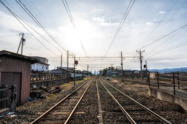 Obuse train station open railway nagano dentetsu line view taken during winter. Taken in Japan.