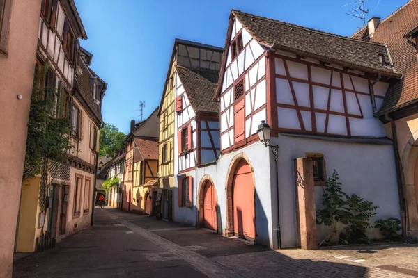 stock image Small alleyway with Alsatian half timbered houses built along. Taken in Colmar, France