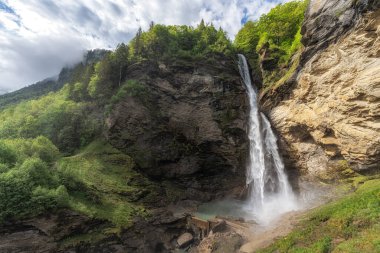 The view of Reichenbach Falls waterfall. Famous waterfall in Bernese Oberland region of Switzerland. clipart