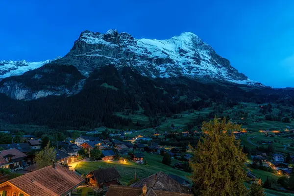 stock image Eiger Mountain viewed from Grindelwald during night hours. Famous landmark in Grindelwald, Switzerland