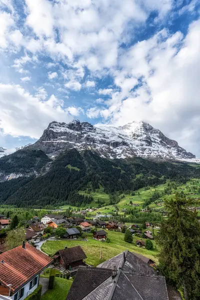 stock image Eiger Mountain viewed from Grindelwald during sunrise hours. Famous landmark in Grindelwald, Switzerland