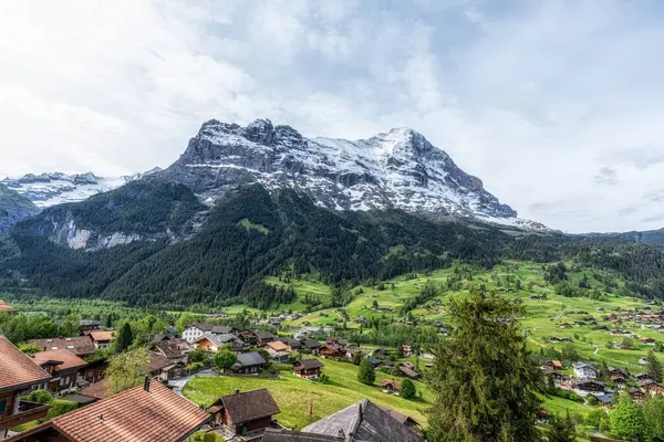 stock image Eiger Mountain viewed from Grindelwald during sunrise hours. Famous landmark in Grindelwald, Switzerland