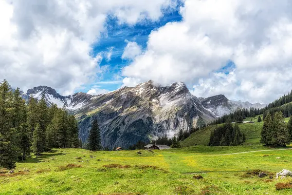 stock image Various Bernese Alps mountain views along Oeschinensee lake hiking path. Taken in Kanderstag, Switzerland