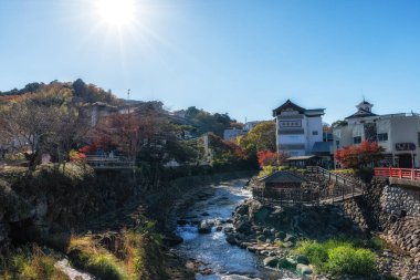 Tokko no Yu public footbath in Shuzenji, Japan with the view of Katsura River and nearby ryokans. Taken on December 3rd 2024 clipart