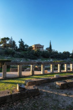 Theseum or temple of hephaistos view during sunset hours taken in ancient agora of athens in greece clipart