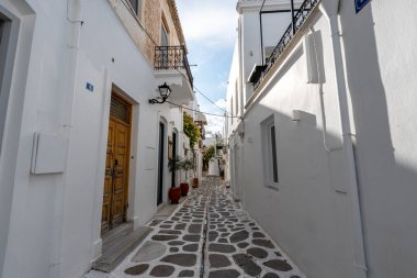 Paros Paroikia old town narrow cobblestone alleyway view. Taken in Paros, Greece clipart