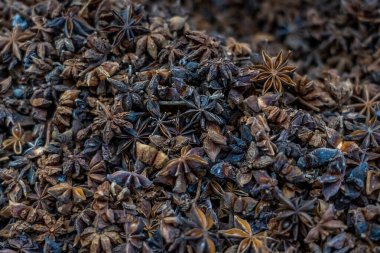Close up of organic dried stars anise background. High quality photo