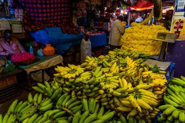 MYSORE, INDIA - 12.01.2023: Fruit and flower stall in the Century old market in Mysore, Karnataka, India. Hight quality photo