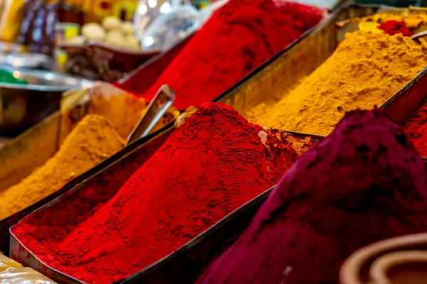 Multicolor bright holi colorful powder in the market for hindus holi festival celebration. Indian market in Mysore. High quality photo