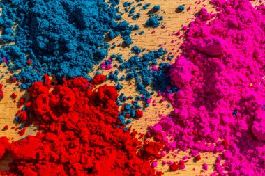 Bright colours for holi festival on the table, colourful Gulal. High quality photo