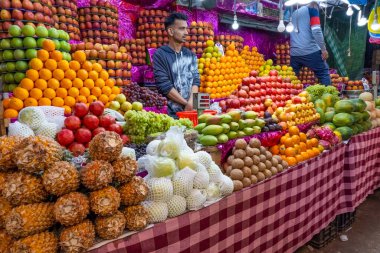 MYSORE, INDIA - 12.01.2023: Fruit stall in the Century old market in Mysore, Karnataka, India. Hight quality photo