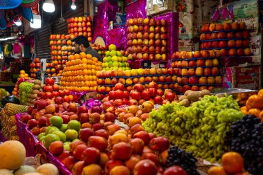 MYSORE, INDIA - 12.01.2023: Fruit stall in the Century old market in Mysore, Karnataka, India. Hight quality photo