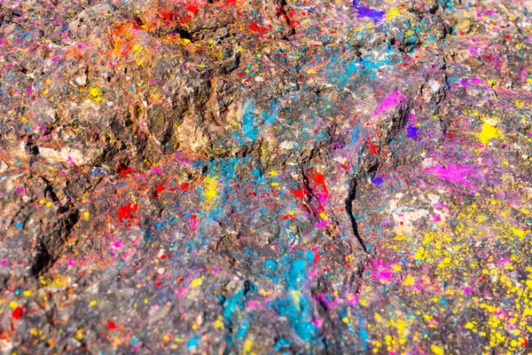 stock image Multi-colored stone pavement after Holi festival in India. Dry paints in bright colors. High quality photo