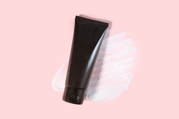 Zwarte Knijp Fles Cosmetische Buis Verpakking Moisturizer Smeren Textuur Roze — Stockfoto