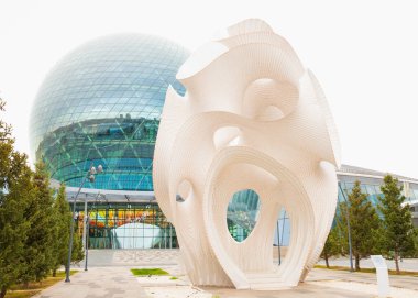 Round sphere modern building, Nur-Alem sphere EXPO 2017 Exhibition Area. Sculpture construction Minima Maxima. Museum Energy of Future and street installation. Astana, Kazakhstan - 10.22.2022.