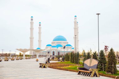 Central mosque of Astana city with four minarets, cathedral mosque. Astana Nur-Sultan, Kazakhstan - 10.24.2022.