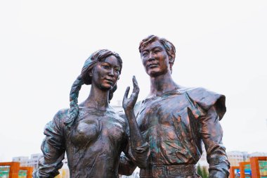 Sculpture of lovers called My Happiness, art object. Waist up portrait. Astana (Nur-Sultan), Kazakhstan - 10.24.2022.