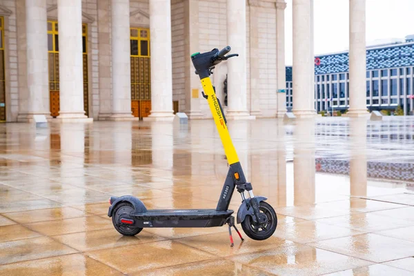 One Electric Scooter Yellow Whoosh Sign Parked Wet Opera House — стокове фото