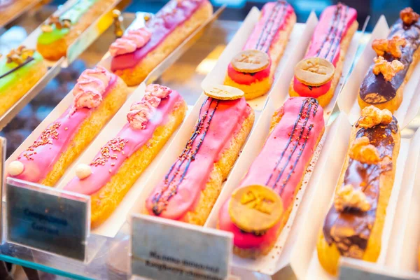 Eclairs Colorful Topping Lot Shop Window Store Shelf French Dessert — Stock Photo, Image