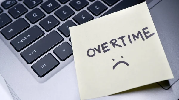 Overtime Written Note Pad Pasted Laptop Company — Stock Photo, Image