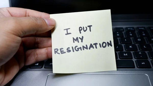 Put Resignation Written Note Pad Held Employee Laptop — Stock Photo, Image