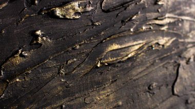 Micro-relief smoky textured waves with golden sparkles