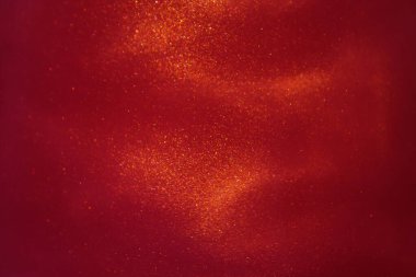 abstract red background with sparkles liquid waves and motion