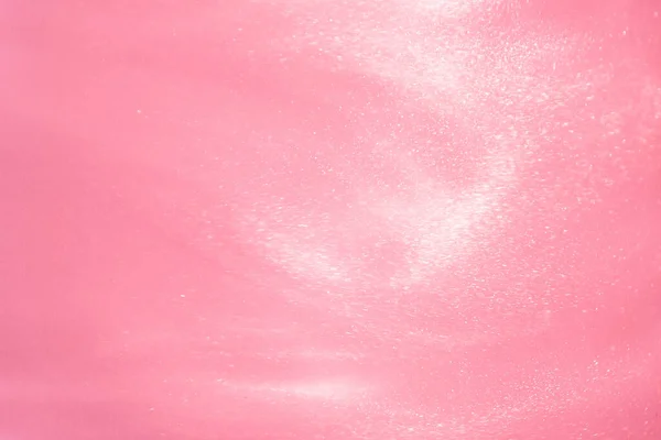 delicate pink background with sequins waves liquid motion