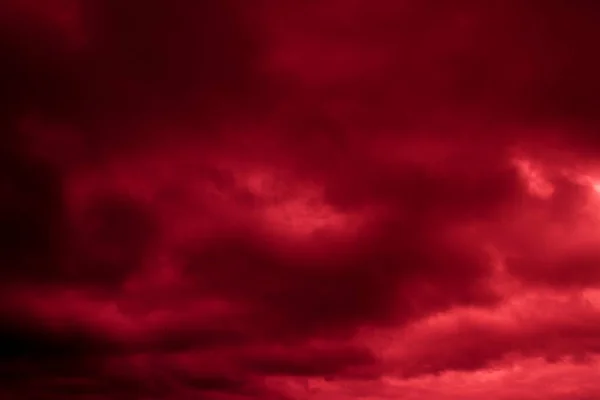 Fiery red sky. Blood clouds. Horror. Background, banner. Horror, explosion, disaster.