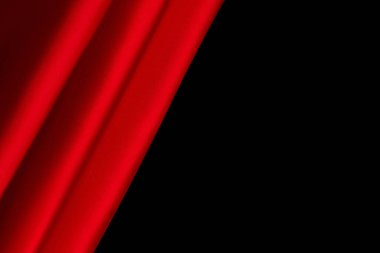 Beautiful red rose close-up, Red silk or satin luxury fabric texture can use as abstract background. Top view, Red silk or satin luxury fabric texture can use as abstract background. Top view