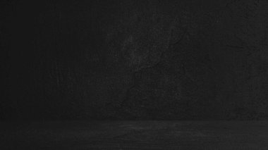 Rough concrete background. in two planes. Pedestal. Put something. Rembrand. Light falls. Darkness. Textured. Black background