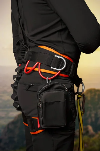 stock image Safety system around the waist. For work at height. industrial mountaineering, tourism, height. In the mountains