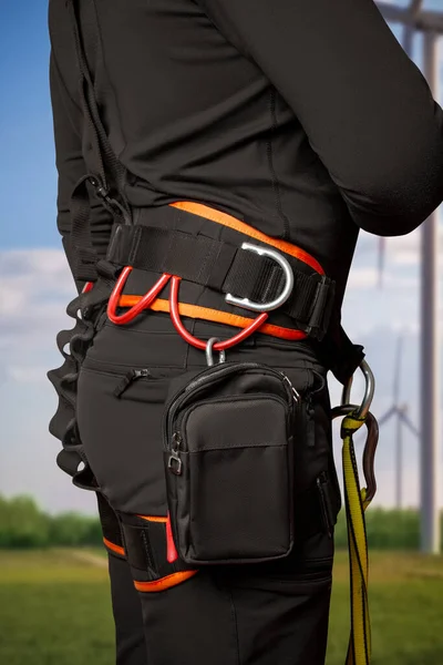 stock image Safety system around the waist. For work at height. industrial mountaineering, tourism, height. Wind generator.