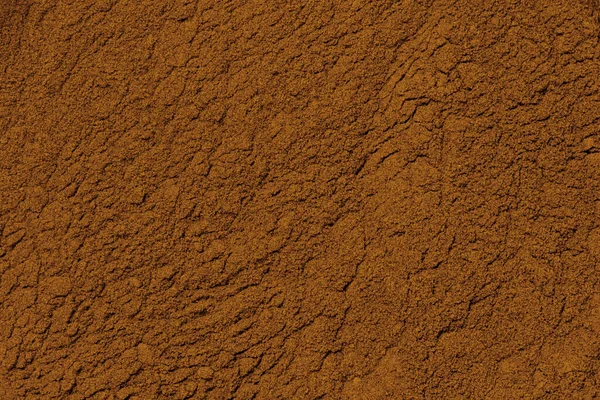古いレトロ壁の背景に黄色の茶色のスタッコ傷 古いメキシコの建物のテクスチャ ココアパウダー テクスチャの壁に錆色のオレンジスタッコテクスチャの壁 土砂粘土粉末粗さ — ストック写真