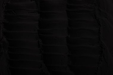 Sülfür tozu, toprak, gölgeler, doku. Derin karanlıktan soyut korkuya, koyu renk soyut doku arka plan, koyu beton zemin veya eski grunge arka plan.