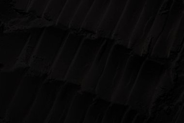 Sülfür tozu, toprak, gölgeler, doku. Derin karanlıktan soyut korkuya, koyu renk soyut doku arka plan, koyu beton zemin veya eski grunge arka plan.