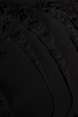 Sülfür tozu, toprak, gölgeler, doku. Derin karanlıktan soyut korkuya, koyu renk soyut doku arka plan, koyu beton zemin veya eski grunge arka plan.