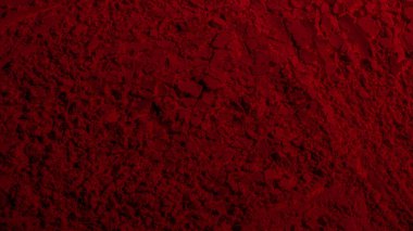 Kırmızı doku. Barut arkaplanı. Pedra, kum. Kırmızı renk. Koyu kırmızı. Yoğun koyu kırmızı. Çatlaklar, dalgalar, çizgiler, daireler, depresyonlar. Dışbükey. Afiş, reklam, yazı için.