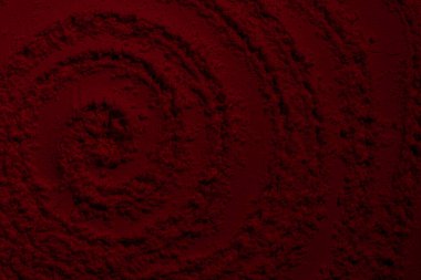 Kırmızı doku. Barut arkaplanı. Pedra, kum. Kırmızı renk. Koyu kırmızı. Yoğun koyu kırmızı. Çatlaklar, dalgalar, çizgiler, daireler, depresyonlar. Dışbükey. Afiş, reklam, yazı için.