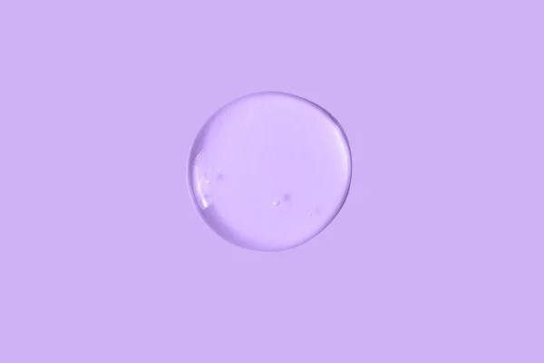 Una Gran Gota Redonda Gel Cosmético Transparente Sobre Fondo Púrpura —  Fotos de Stock