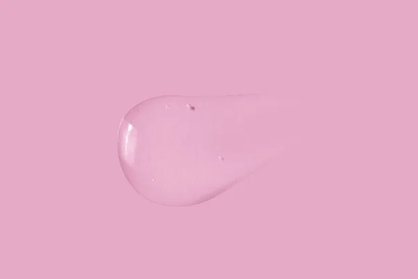 Текстура Большого Мазка Прозрачного Геля Розовом Фоне — стоковое фото