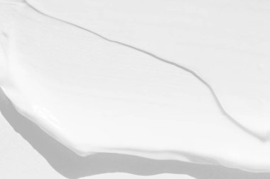 Büyük beyaz kozmetik krem lekeleri. Kremin dokusu yakın plan..