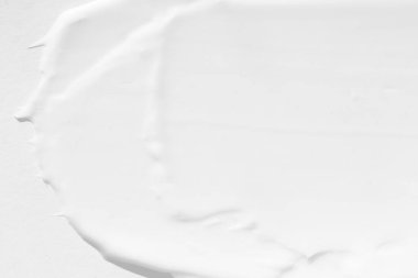 Büyük beyaz kozmetik krem lekeleri. Kremin dokusu yakın plan..