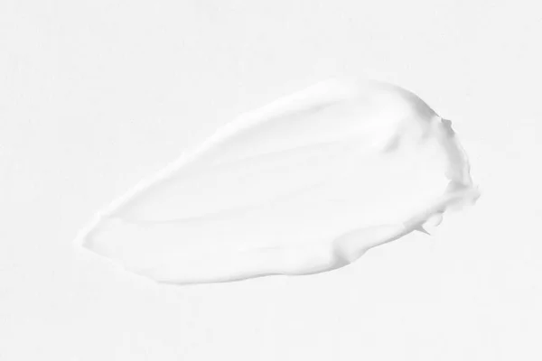 stock image large smears of white cosmetic cream. The texture of the cream close-up.