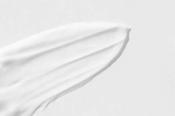 Grote Uitstrijkjes Van Witte Cosmetische Crème Textuur Van Crème Close — Stockfoto